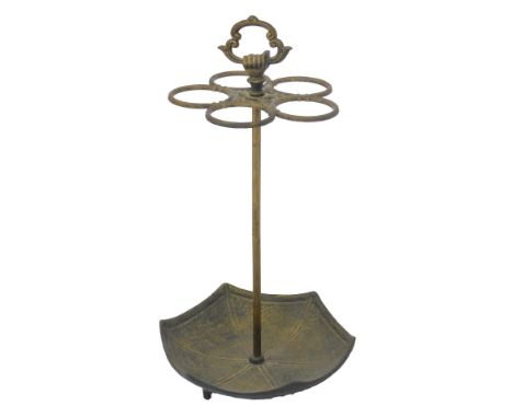 A 20thC cast iron umbrella stand, modelled as an upturned umbrella with five ring sections for umbrellas, with brushed gold c