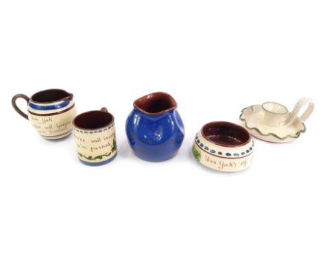 A group of Torquay ware, comprising mug, jug, circular dish, 12cm diameter, vase, blue glazed vase of shaped form, 10cm high,