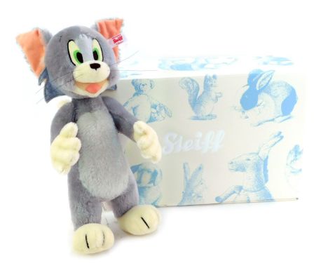 A Steiff Tom soft toy, limited edition number 1134/2000, 33cm high, with certificate, boxed with outer packaging.