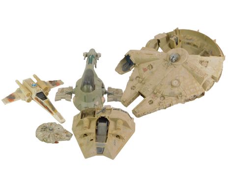A Star Wars model of the Millennium Falcon, together with a X-Wing Fighter and a Slave 1 Ship.