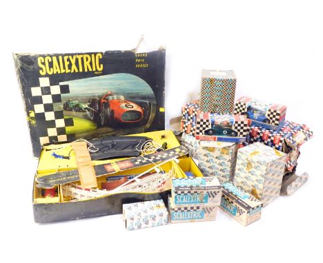 A group of Scalextric, to include a box containing track, cars, etc., together with further track, owner's stand and pit, han
