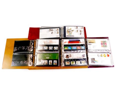 Three albums containing Royal Mail first day covers, to include Sir Isaac Newton, Sport, Birds, Edward Lear, Thomas Hardy, et