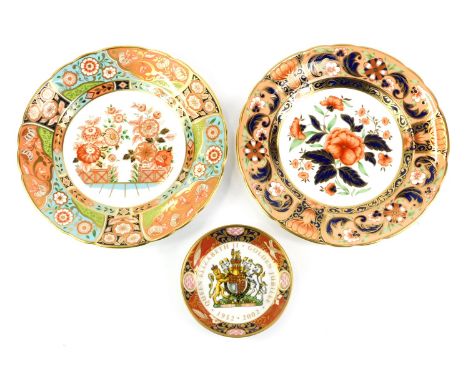 Two Royal Crown Derby porcelain plates, decorated in the Regency Flowers pattern, and the Derby Pink Carnelias pattern, each 