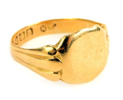 An Edward VII 18ct gold signet ring, with central vacant shield, and three row shoulders, Chester 1908, ring size R, 5g all i