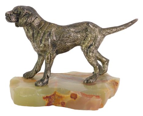 A 1960s/1970s model of a dog, on an onyx base, the dog with a silvered finish, 12cm high, 13cm wide. (AF)