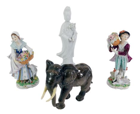 A collection of 19thC and later ceramics, comprising a blanc de chine figure of Guan Yin, 25cm high, a Goebel elephant, 12cm 