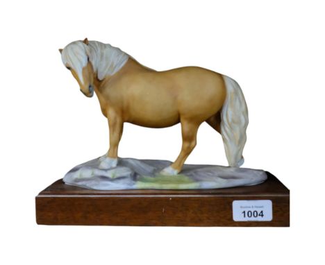 Royal Worcester model of a Shetland pony, on wooden plinth, by Bernard Winskill, 136/500