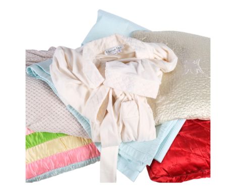 A Chinese golden camel red eiderdown, 202cm x 162cm, a striped eiderdown, a Christian Dior dressing gown, etc