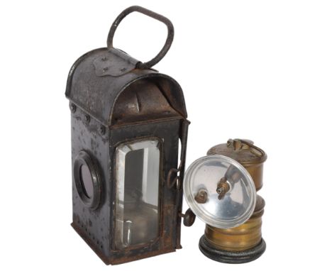 A small Premier Lamp &amp; Engineering Company Ltd miner's lamp, and a Light of London Patent no. 178544 railway carriage lam