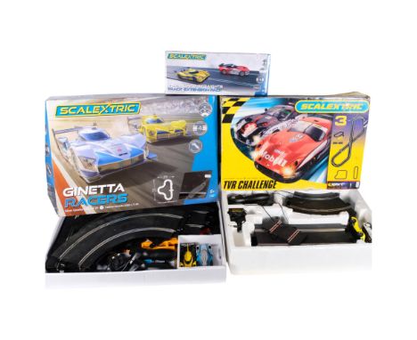 A boxed Scalextric 4 standard straights track extension pack, a boxed Scalextric TVR Challenge game, and a boxed Scalextric G