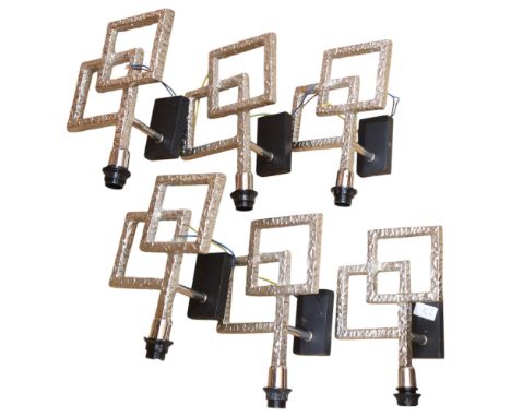 A set fo 6 Heathfield Lighting silvered embossed metal wall lights, H27cm