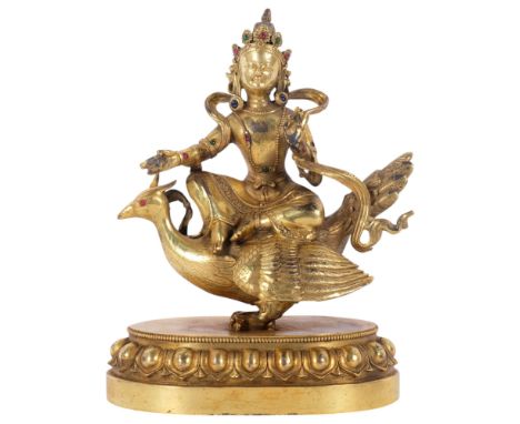 A Tibetan bronze study of Mahamayuri, H23.5cm