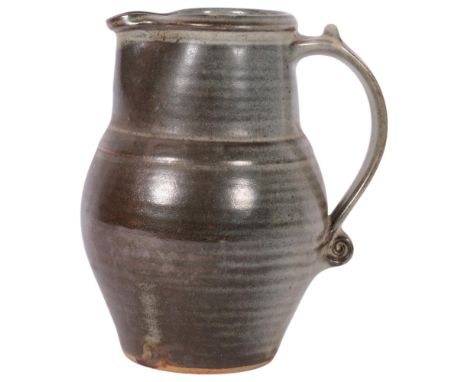 A glazed Studio jug from the Leach Pottery, H20cm