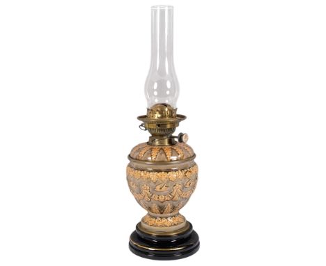An Antique pottery oil lamp, probably by Doulton, with a Hinks & Sons patent brass mount, the handle marked Benetfink & Compa