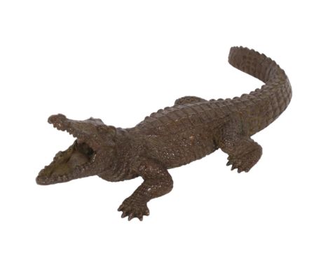 A Japanese patinated bronze crocodile, signed, 14cm