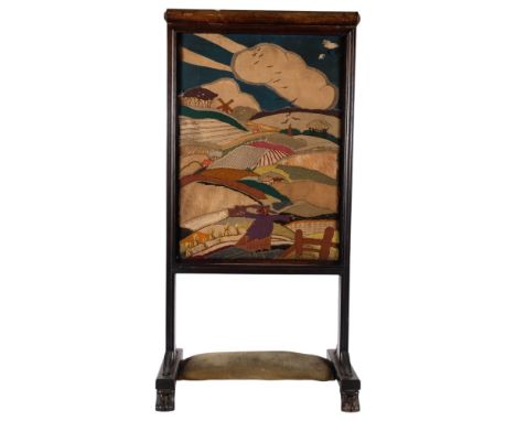A 19thC fire screen with inset applique-work panel, depicting landscape with scarecrow and windmill, H89cm