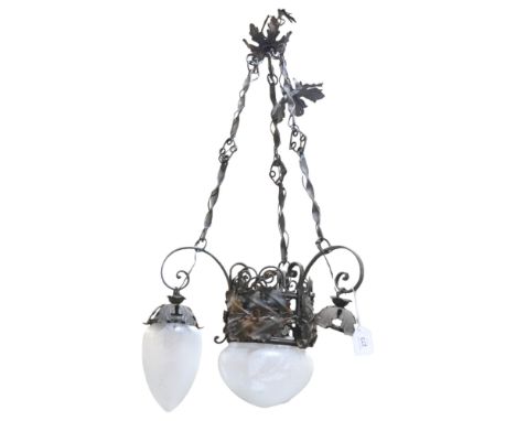 An Arts and Crafts wrought-iron chandelier, with foliate decoration and frosted glass shades, 1 shade rim chipped