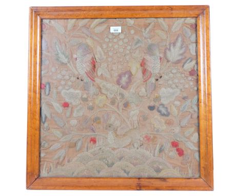 An Antique maple-framed embroidered crewelwork panel, depicting parrots and flowers, 64cm x 64cm