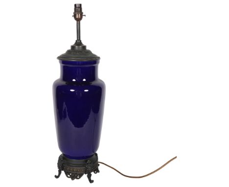 A blue ceramic and metal-mounted table lamp, H59cm