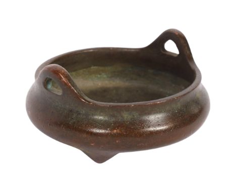 A Chinese patinated bronze incense burner, character marks on base, 8cm