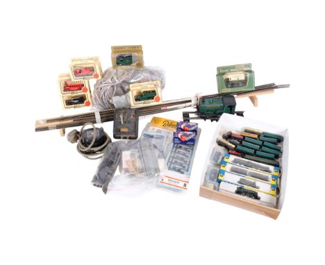 A O gauge Southern Train engine, a quantity of of N gauge train accessories, transformers, and track, boxed diecast cars, etc