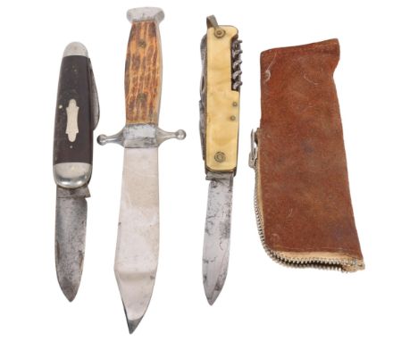 A staghorn-handled hunting knife, Swiss Army knife, and another (3)