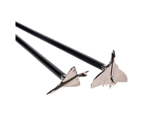 An ebonised walking stick with polished steel Vulcan handle, and another with Concorde handle