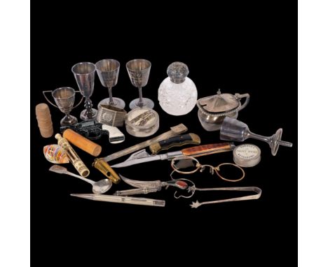 Various silver and collectables, including small silver trophies, hardstone dagger bookmark, propelling pencil, dressing tabl