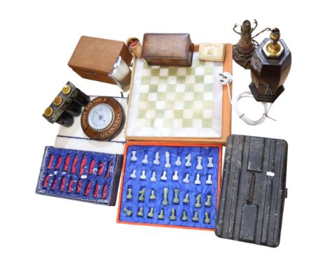 A Guinness barometer, boxed chessmen and another part set, lamp, etc