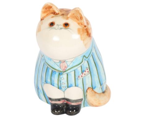 JOAN DE BETHEL - a Cinque Ports Pottery seated cat figure, decoupage style decoration with blue and green striped jacket with