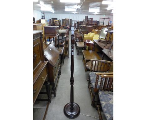 A mahogany standard lamp 
