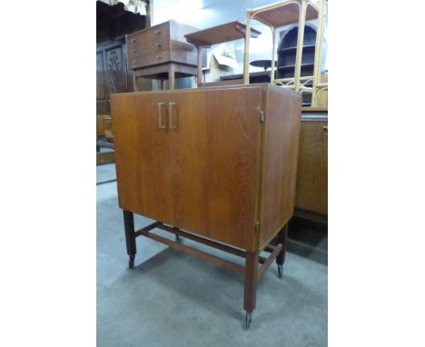 A teak record cabinet 