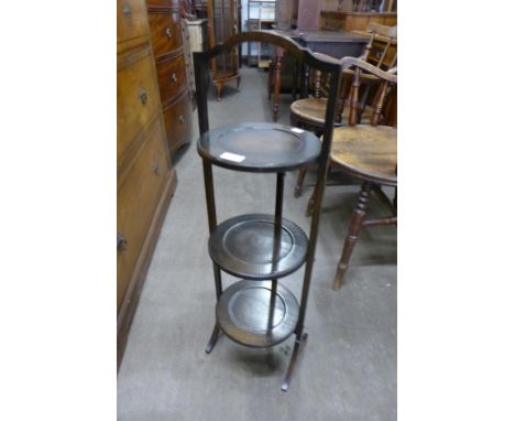 An oak folding cake stand 