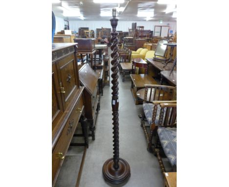 An oak barleytwist standard lamp 