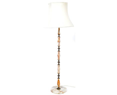 A retro vintage mid Century onyx and brass freestanding upright standard lamp light having green marble and brass turned colu