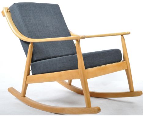 Scandart - A retro vintage 1960's beech and elm rocking chair rocking chair&nbsp; having shaped curved armrests with new Pire