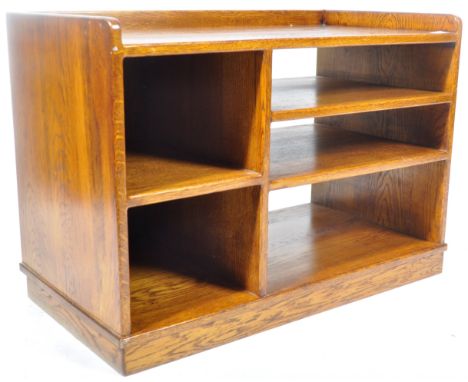 A vintage early - mid 20th Century oak industrial sideboard credenza storage unit having a gallery surround to with a series 