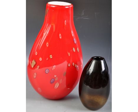 Murano (Manner Of) - a 20th century Millefiori studio art glass vase in the Murano style, in red, with white interior. Along 