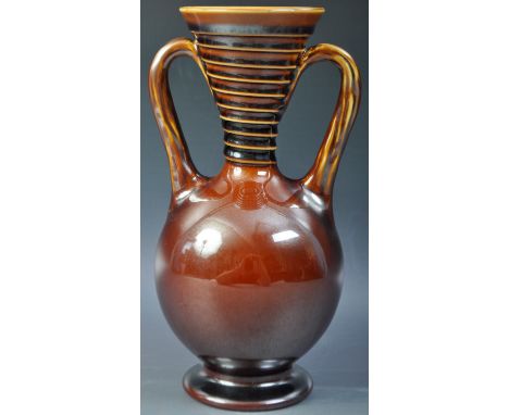 Christopher Dresser - Linthorpe Pottery - A vintage 20th Century studio pottery twin handled vase of classical Roman pottery 