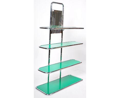 A 20th Century Art Deco shop display stand / shelving unit of tubular chrome construction having four graduating shelves set 