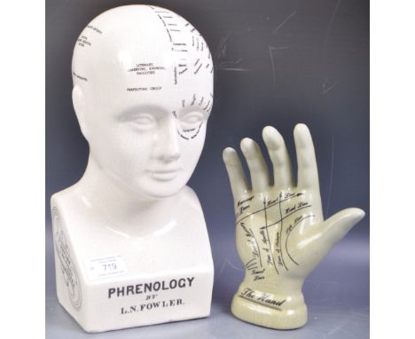 A reproduction Victorian ceramic Phrenology head and hand with each having a crackle glaze finish with black lettered section