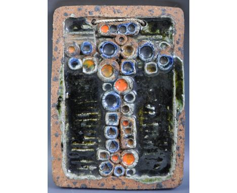 A retro vintage 1960's West German pottery Fat Lava plaque. The tile of rounded rectangular form with glazed detailing and ab