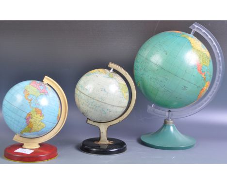 A collection of retro vintage 20th Century desk globes comprising a tinplate Chad Valley 10174 example a larger plastic Phill