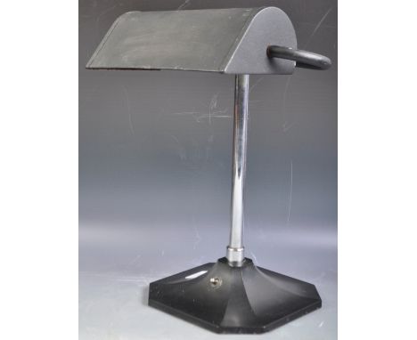 An original vintage early 20th Century Art Deco 1930's industrial bankers desk lamp having a black coated enamel scrumble fin