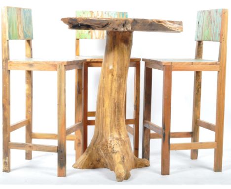 An incredible bespoke rustic living edge wood tiki cocktail bar counter table of tall form comprising a stunning living edge 