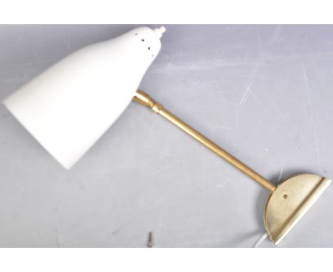 A retro vintage 20th Century brass and metal anglepoise wall / desk mounted lamp light having an adjustable brass scissor arm