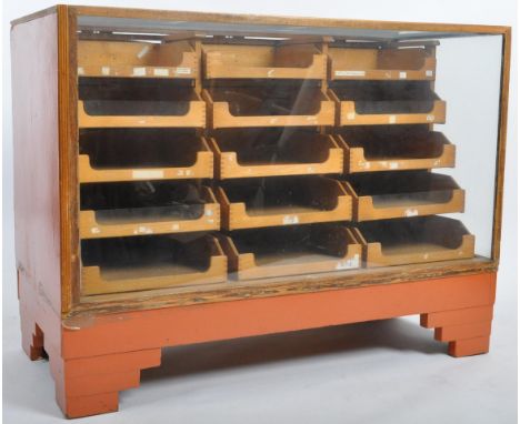 A vintage early 20th Century Art Deco haberdashery point of sale shop display cabinet counter of good proportions having a cl
