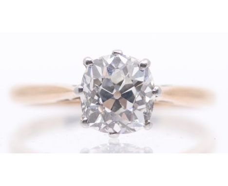 A diamond solitaire 9ct gold ring, comprising an old cushion cut diamond, weighing approx 1.70carats, assessed colour J/K ass