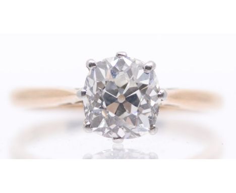 A diamond solitaire 9ct gold ring, comprising an old cushion cut diamond, weighing approx 1.70carats, assessed colour J/K ass