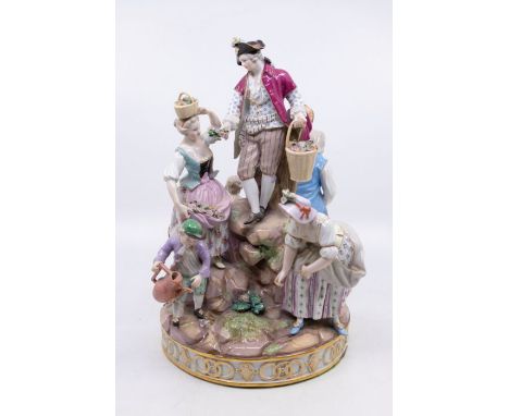 A late 19th/ early 20th Century Meissen figural group after the 18th Century Gardener series modelled by Michel Victor Acier,